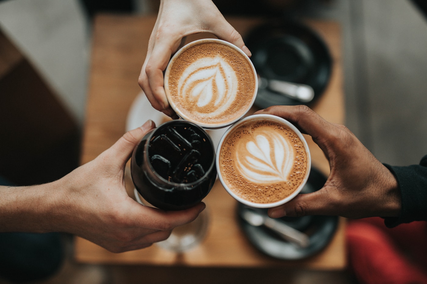 Roasters tasting coffee together after a bench session
