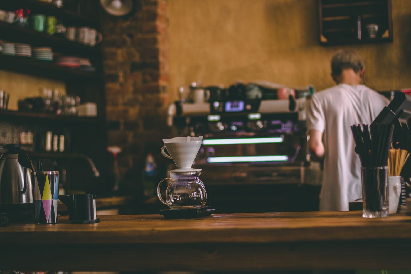 Pour-over bench beside sample roaster at Railtown studio
